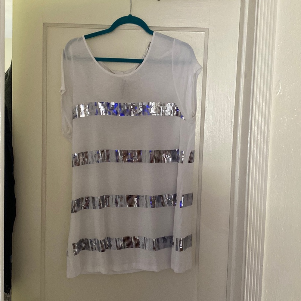 Super cute, corporate casual, stretchy top. Super comfy, only worn once.